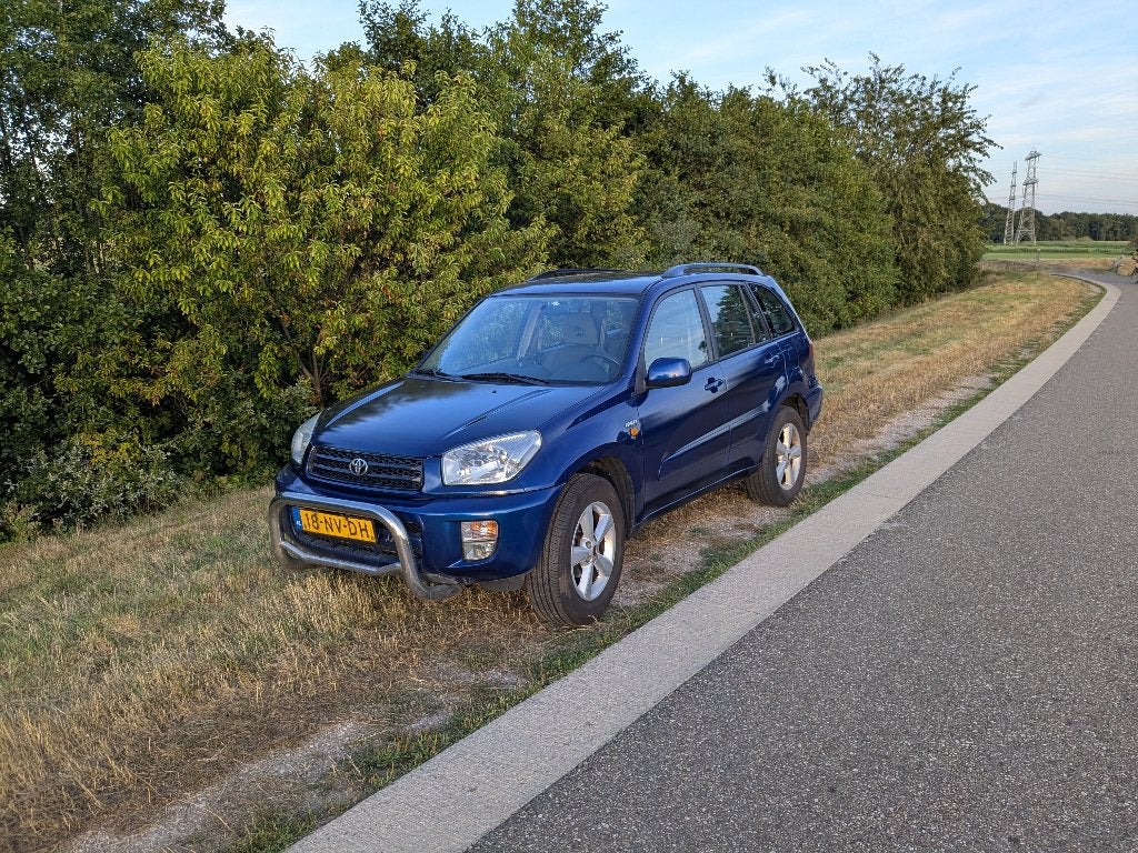 Toyota Rav4 1.8 I 5D 2004 Blauw, Auto's, Voorwielaandrijving, 4 cilinders, Blauw, Grijs