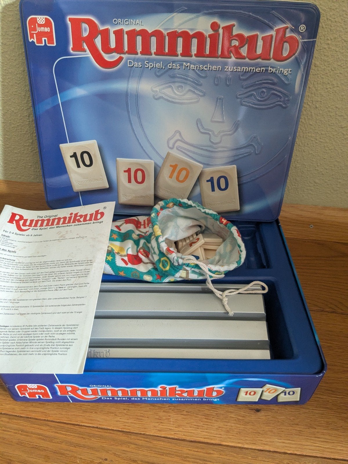 Rummikub in metalen bewaarblik, Ophalen