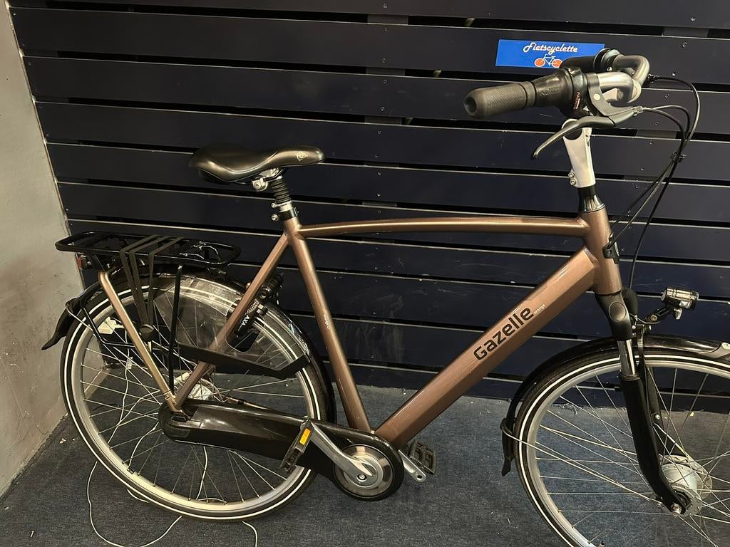 Gazelle orange C7 plus 61cm of 57cm show model met garantie, Ophalen, Zo goed als nieuw, Gazelle