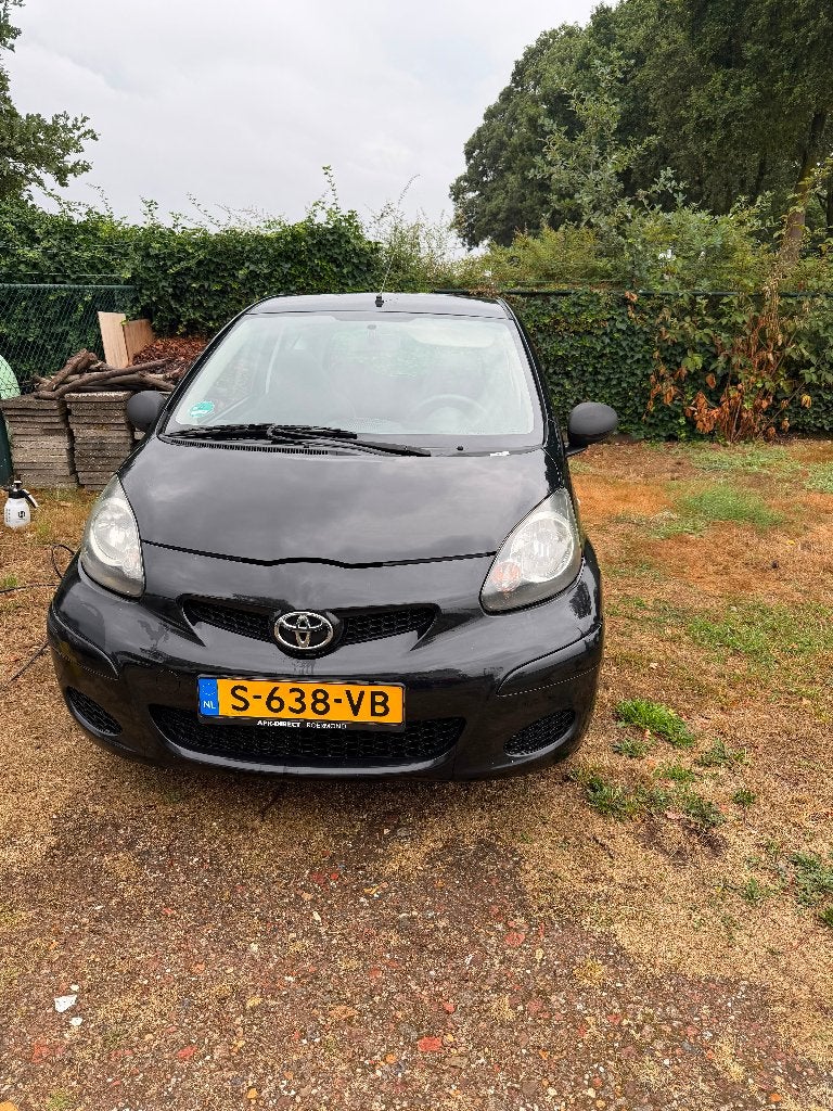 Toyota Aygo 2009 Zwart, Auto's, Voorwielaandrijving, Stof, Zwart, 4 stoelen