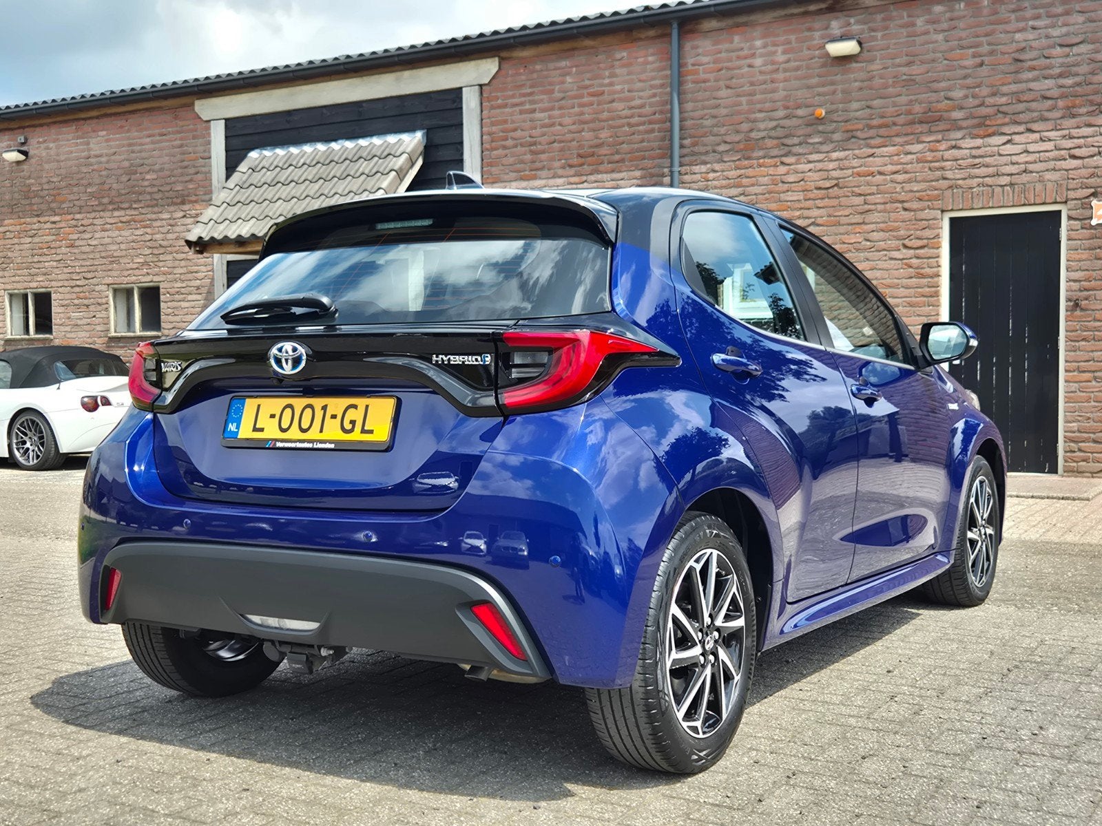 Toyota Yaris 1.5 Hybrid 116pkCVT 2021 Blauw I Trekhaak I PDC, Euro 6, Met garantie (alle), Blauw, 450 kg