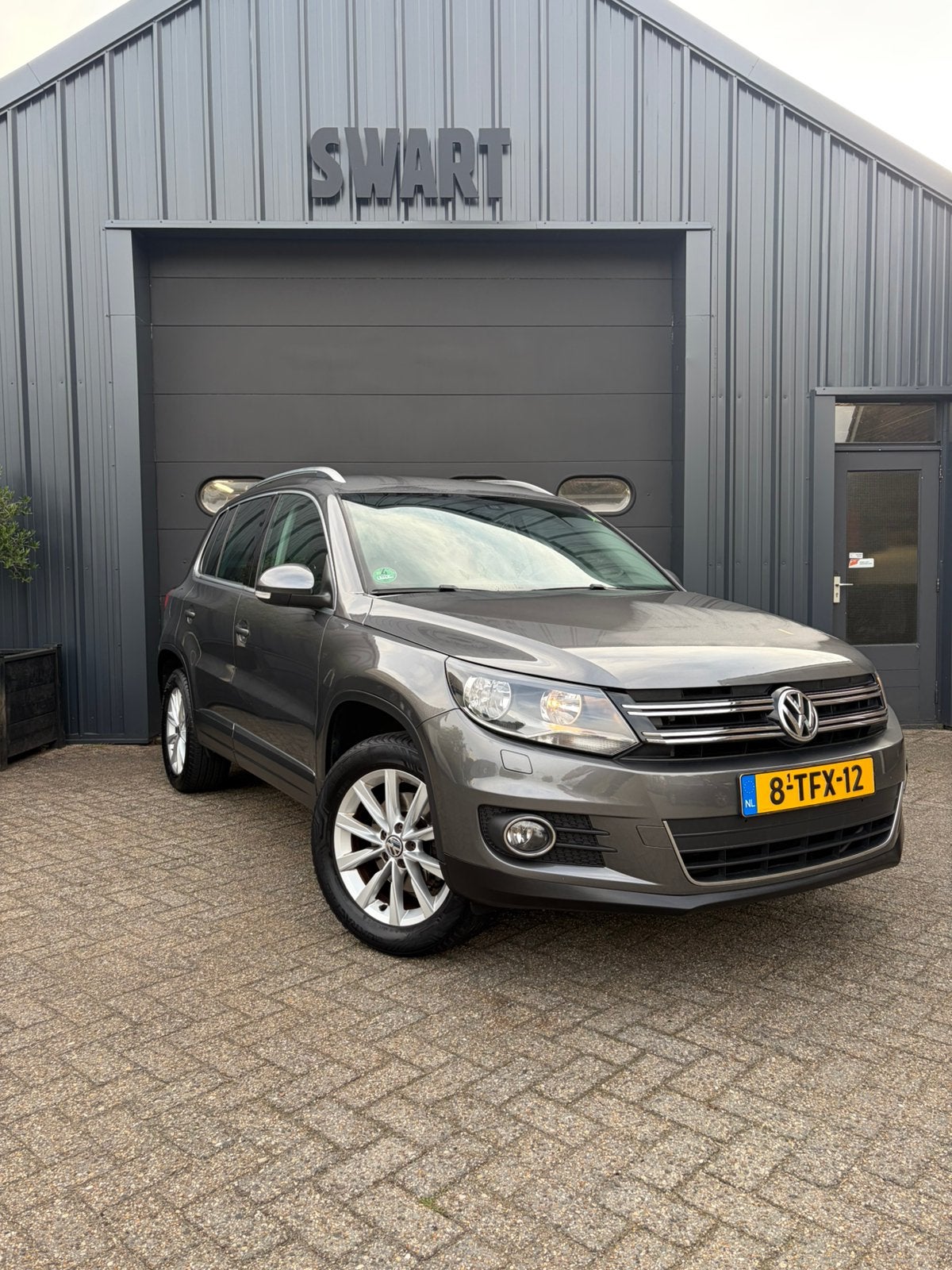 Volkswagen Tiguan 1.4 TSI bleu 2011 AIRC/ CRUIS/ TREK, Auto's, Voorwielaandrijving, Euro 5, 15 km/l, Zwart