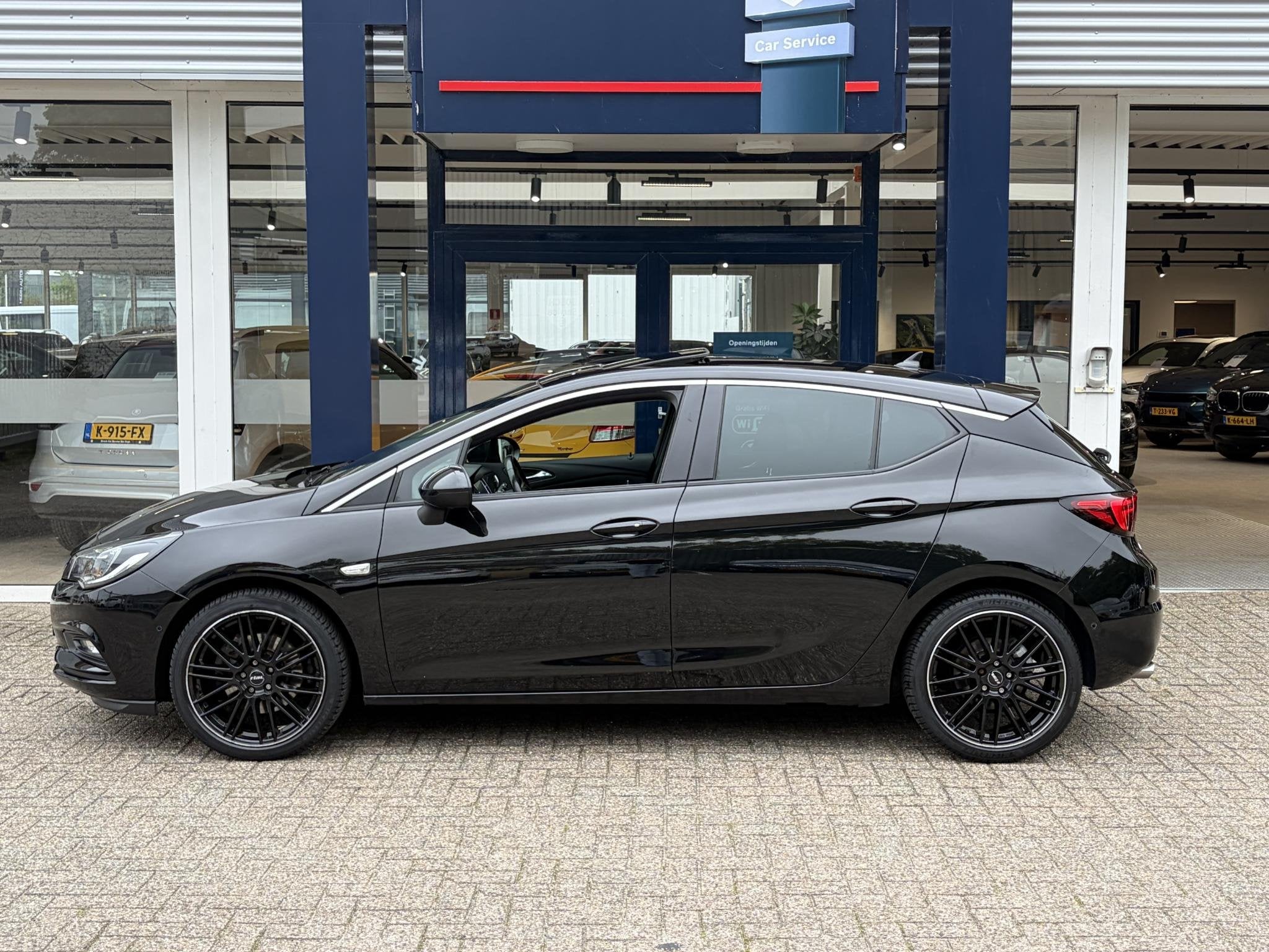 Opel Astra 1.6 Turbo Business Executive / Automaat / 200 PK, Auto's, Gebruikt, 4 cilinders, Zwart, Bedrijf