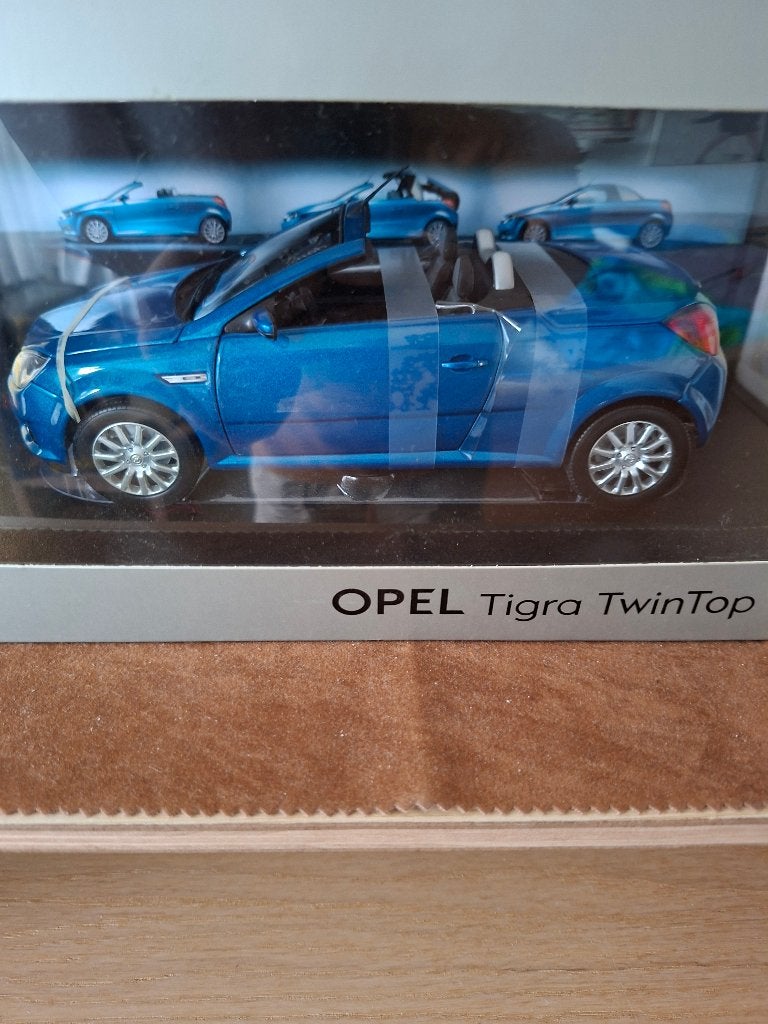 opel tigra  twintop blauw  1/18, Hobby en Vrije tijd, Modelauto's | 1:18, Ophalen of Verzenden, Nieuw, Auto, Norev