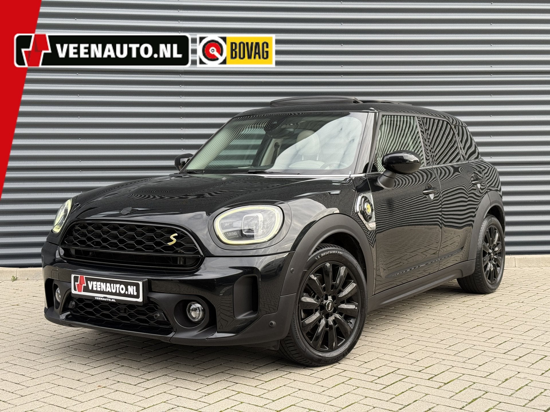 MINI Countryman 1.5 Cooper SE ALL4 Leder/Pano/H&K (bj 2022), Auto's, Automaat, Dealer onderhouden, Countryman, Zwart