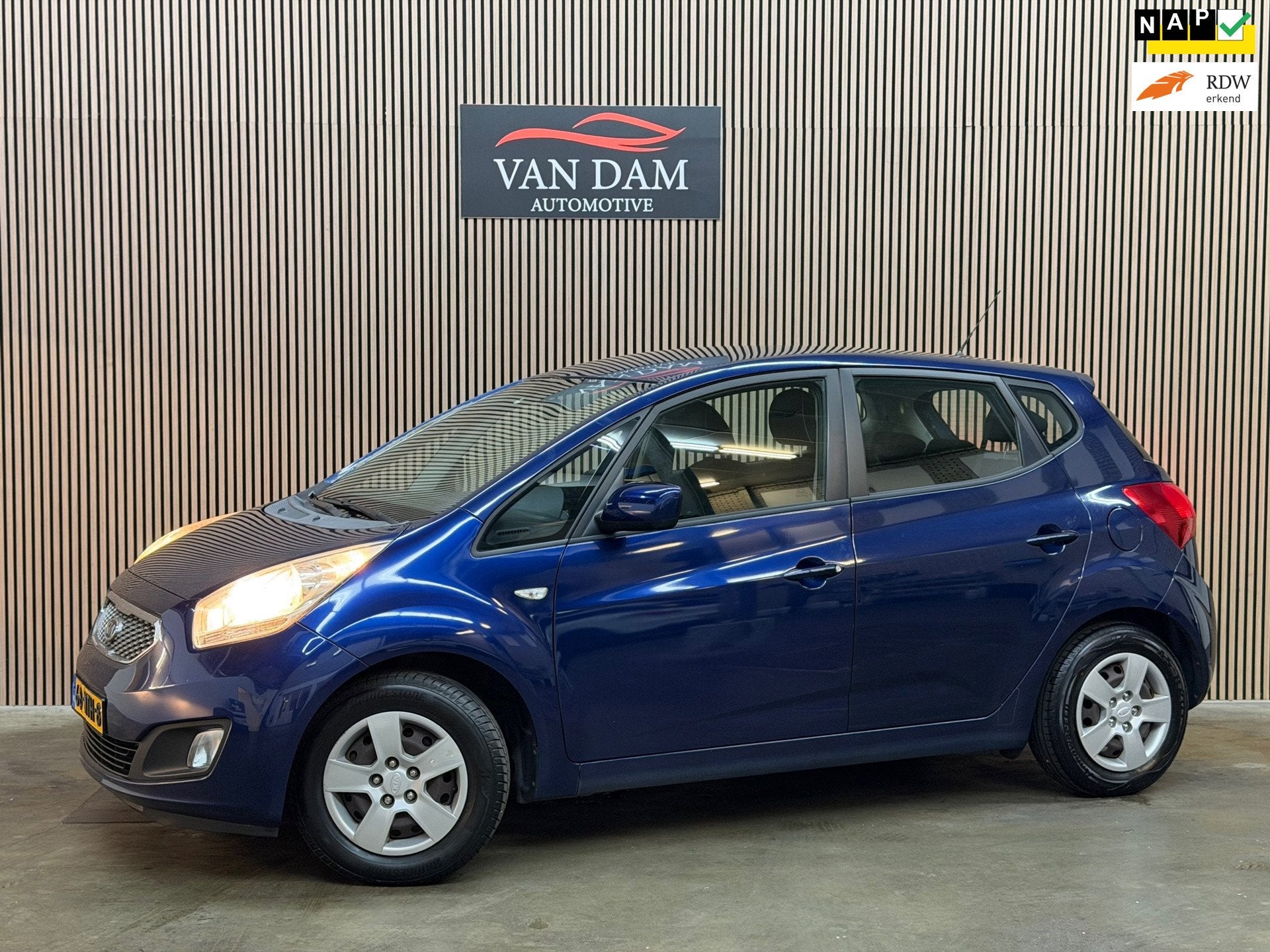 Kia Venga 1.4 CVVT Seven 2010 NAP CRUISE CAMERA TREKHAAK NAV, Auto's, Voorwielaandrijving, Euro 5, Stof, Gebruikt