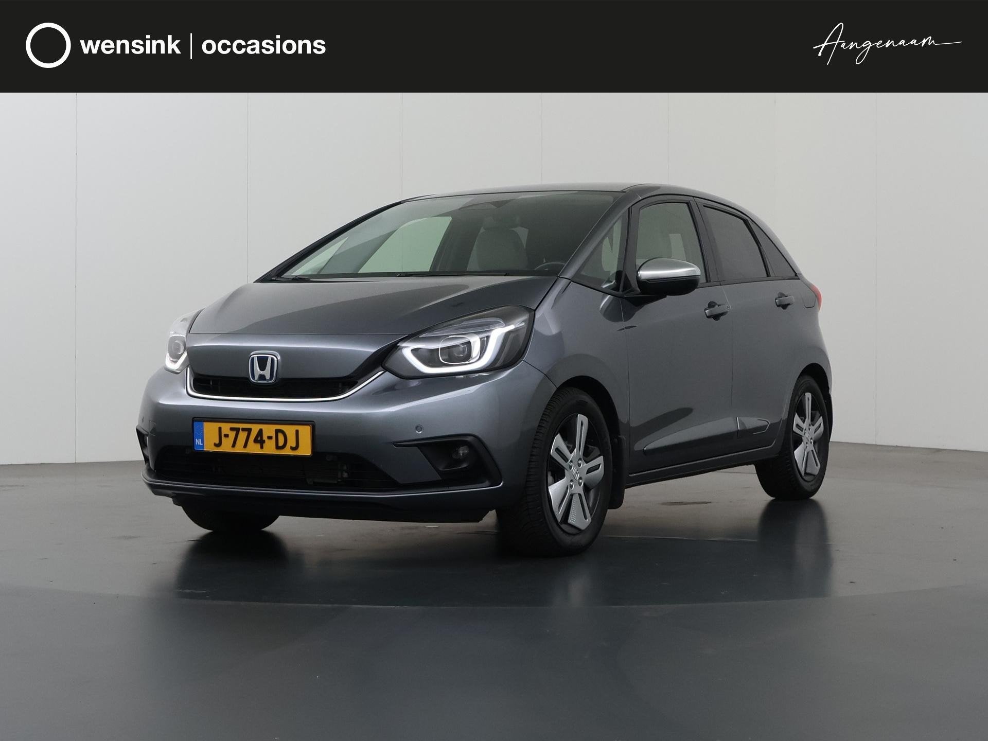 Honda Jazz 1.5 I-MMD Hybrid Executive | Navigatie | Parkeerc, Auto's, Euro 6, Leder en Stof, Origineel Nederlands, Bedrijf