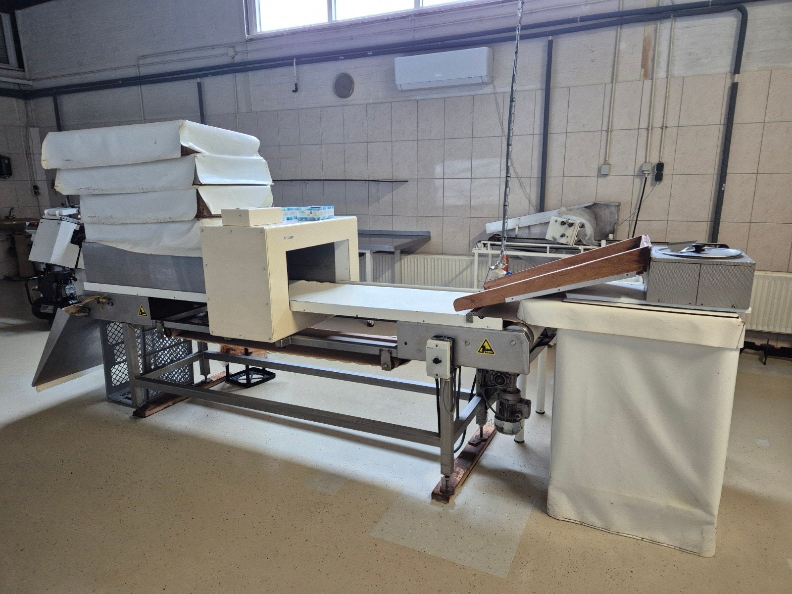 Industriële transportband voor bakkerij, Ophalen