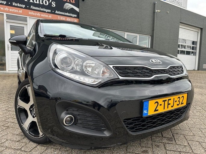 Kia Rio 1.2 I Plus Pack I 2014 I Zwart, Auto's, Kia, Particulier, Rio, ABS, Achteruitrijcamera, Airbags, Airconditioning, Alarm