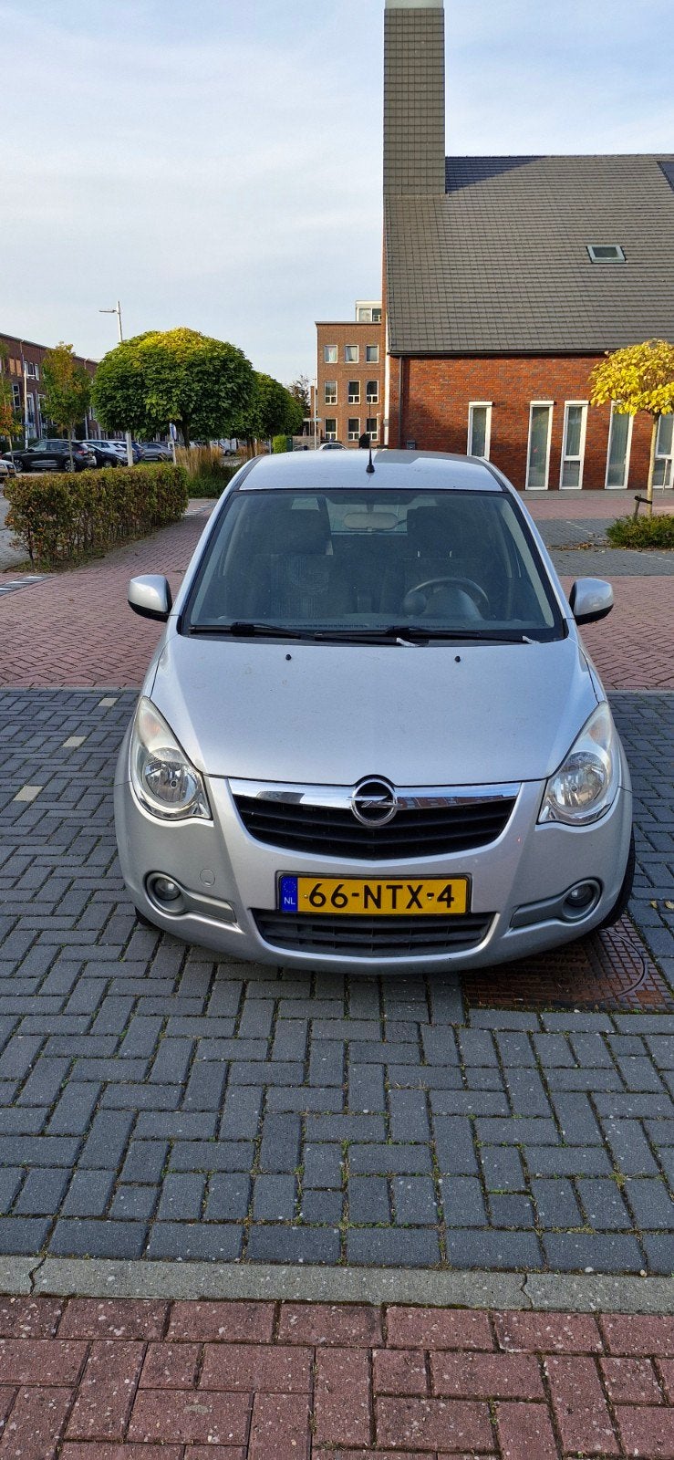 Opel Agila 1.2 16V AUT 2010 Grijs, Auto's, Stof, 40 €/maand, 4 cilinders, Origineel Nederlands