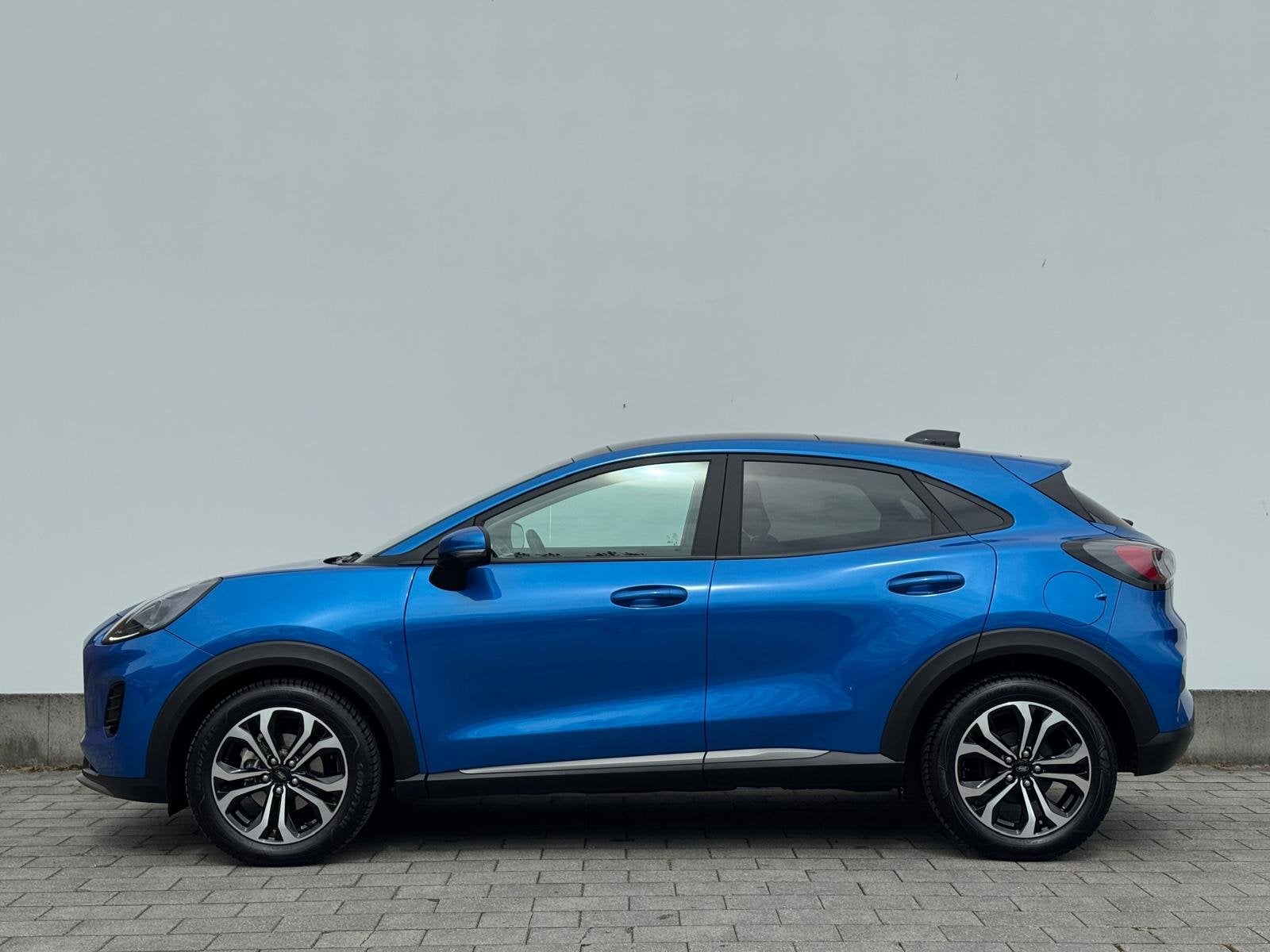 Ford Puma EcoBoost Hybrid 125 pk Titanium | Pano | Elek acht, Auto's, Ford, 12 maanden, Blauw, 665 kg, Bedrijf