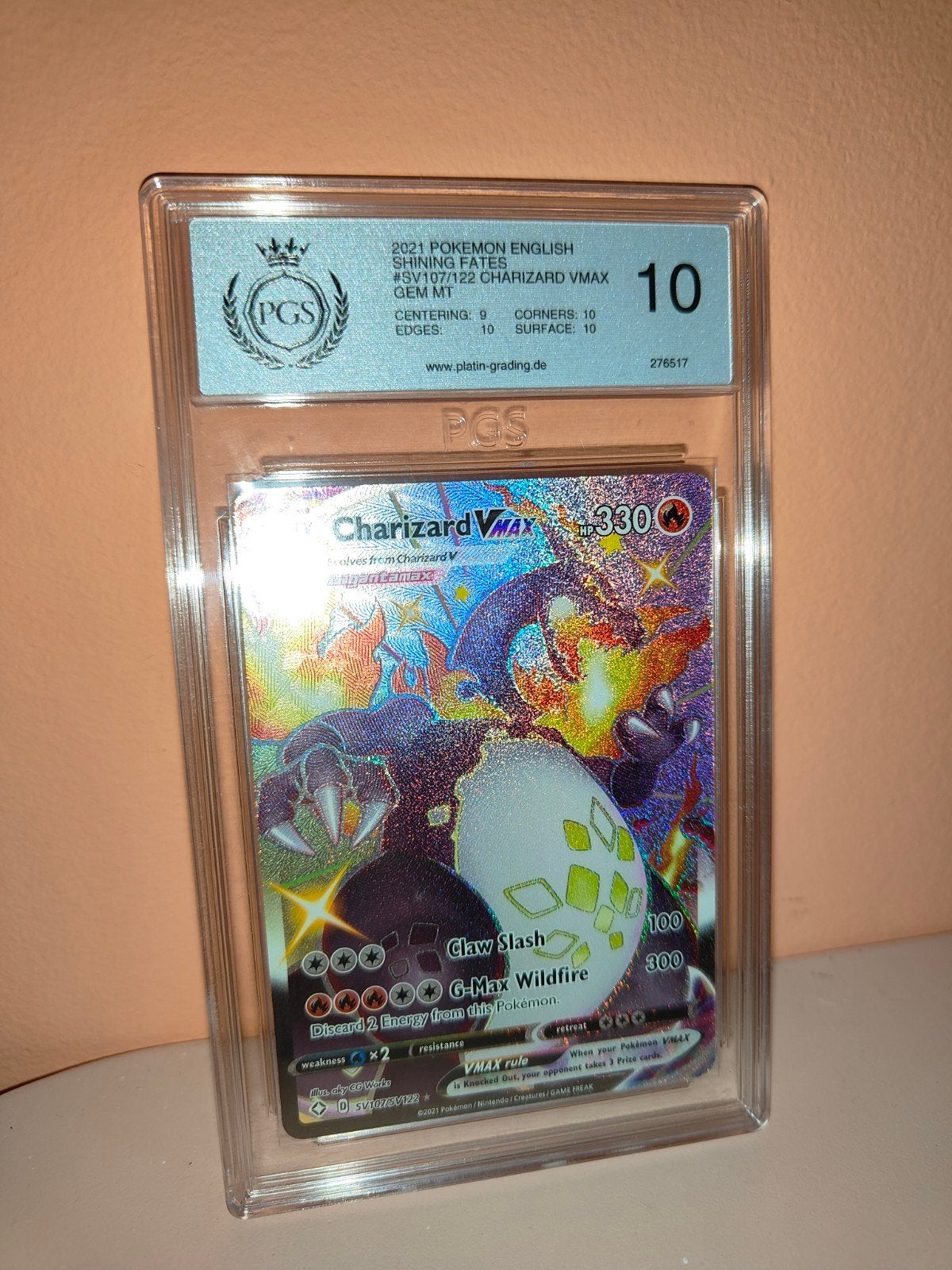 Pokémon Charizard VMAX SV107/SV122 GEM MT 10 (PGS Graded), Ophalen of Verzenden, Zo goed als nieuw, Losse kaart, Foil