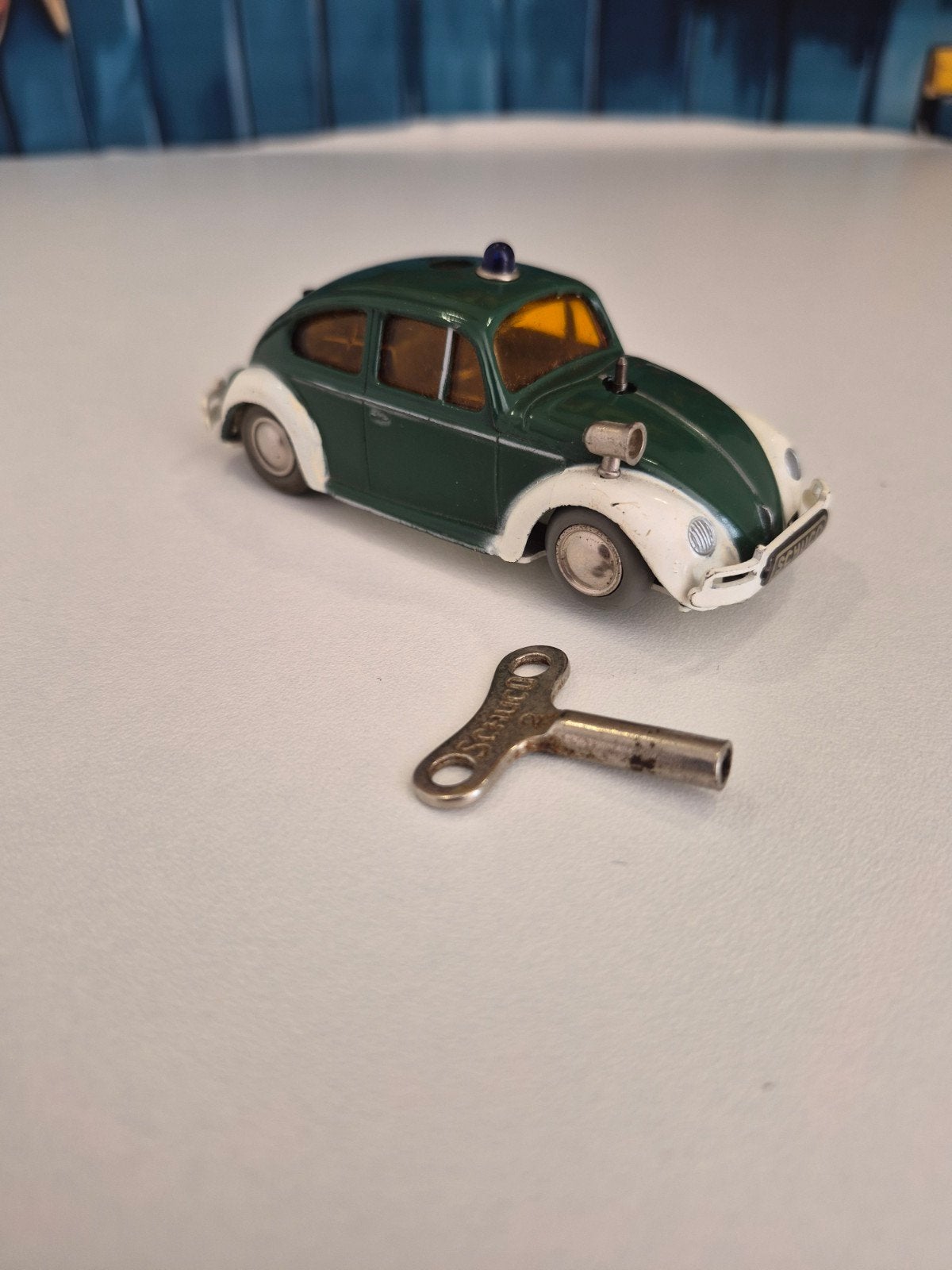 Schuco 3000 Volkswagen Kever Politie Auto met Opwindsleutel, Antiek en Kunst, Ophalen of Verzenden