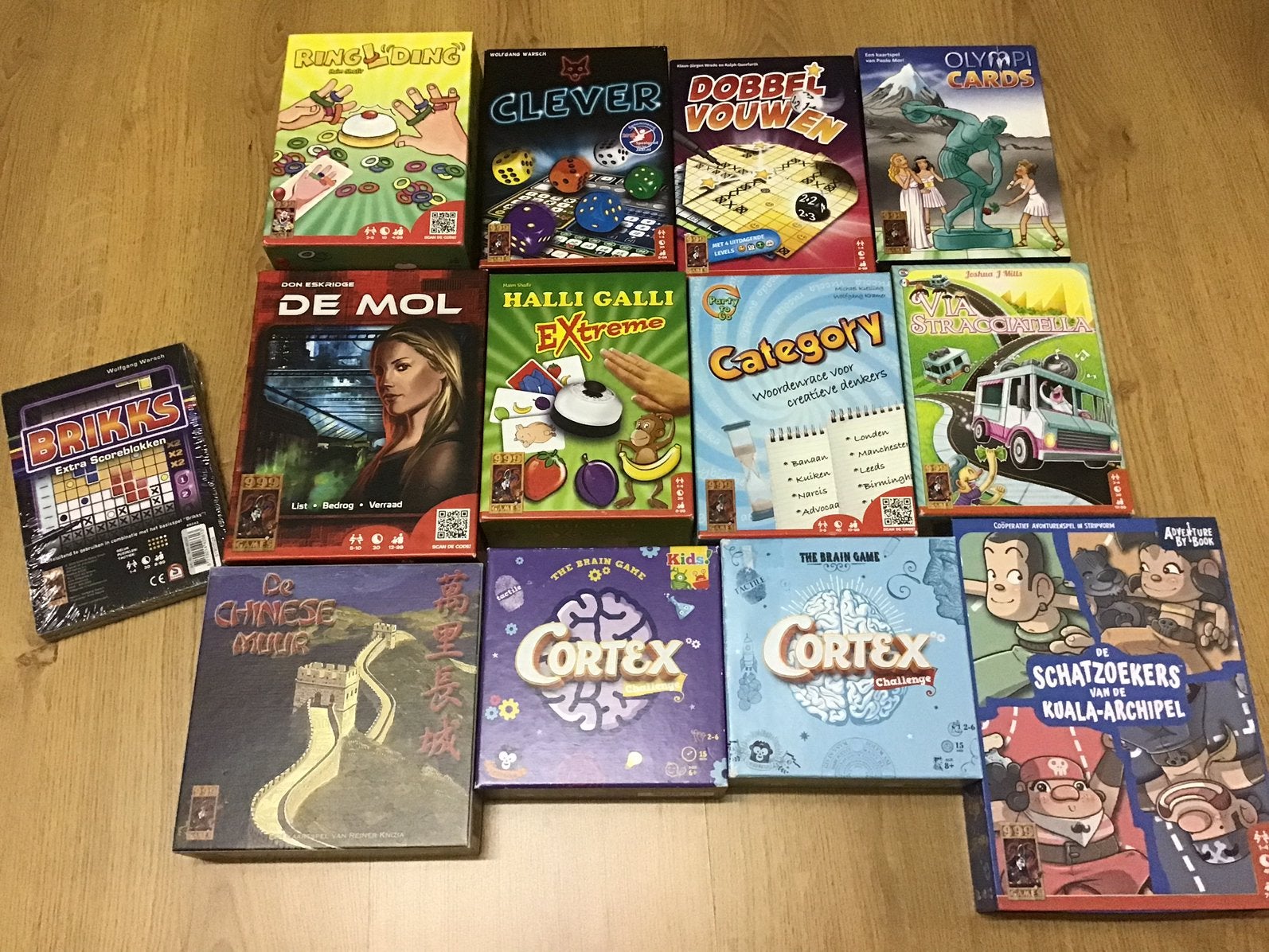 12 spellen en een scoreblok Brikks (nieuw), Ophalen of Verzenden, Zo goed als nieuw