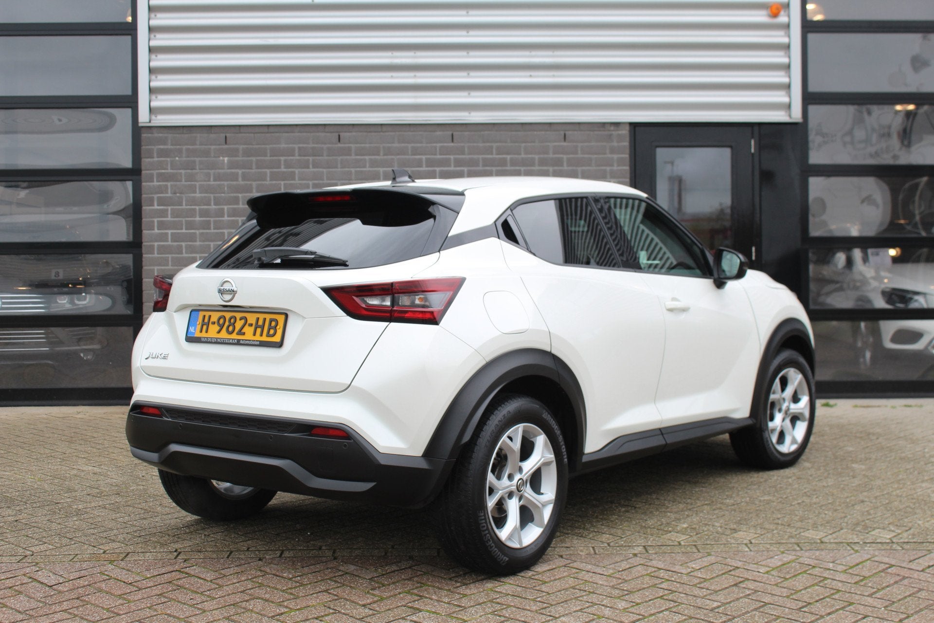Nissan Juke 1.0 DIG-T N-Connecta / Carplay / Camera / N.A.P., Auto's, Stof, Met garantie (alle), Automatische klimaatregeling