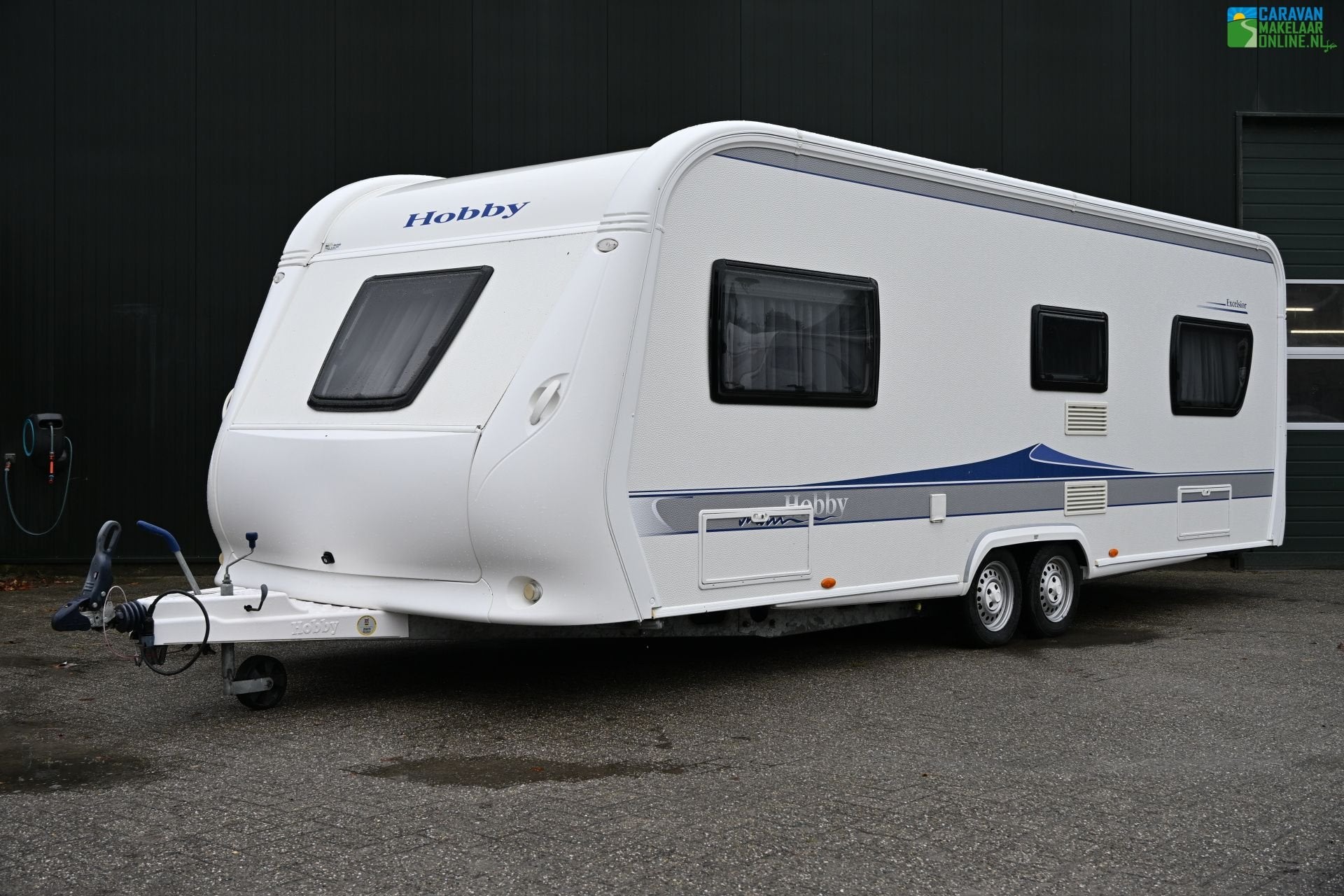 Hobby Excelsior 650, Caravans en Kamperen, Rondzit, Hobby, 7 tot 8 meter, Bedrijf