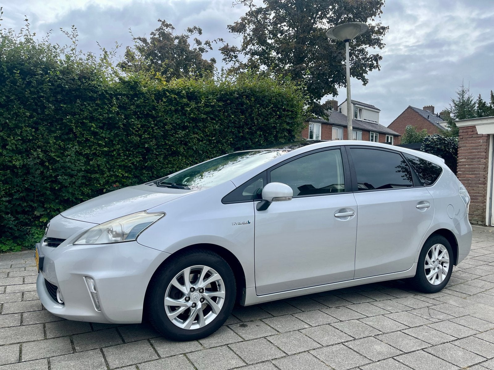 Toyota Prius Wagon 1.8 Full Hybrid 136PK Aut 96g 2012 Grijs, Auto's, Euro 5, 4 cilinders, 7 stoelen, Origineel Nederlands