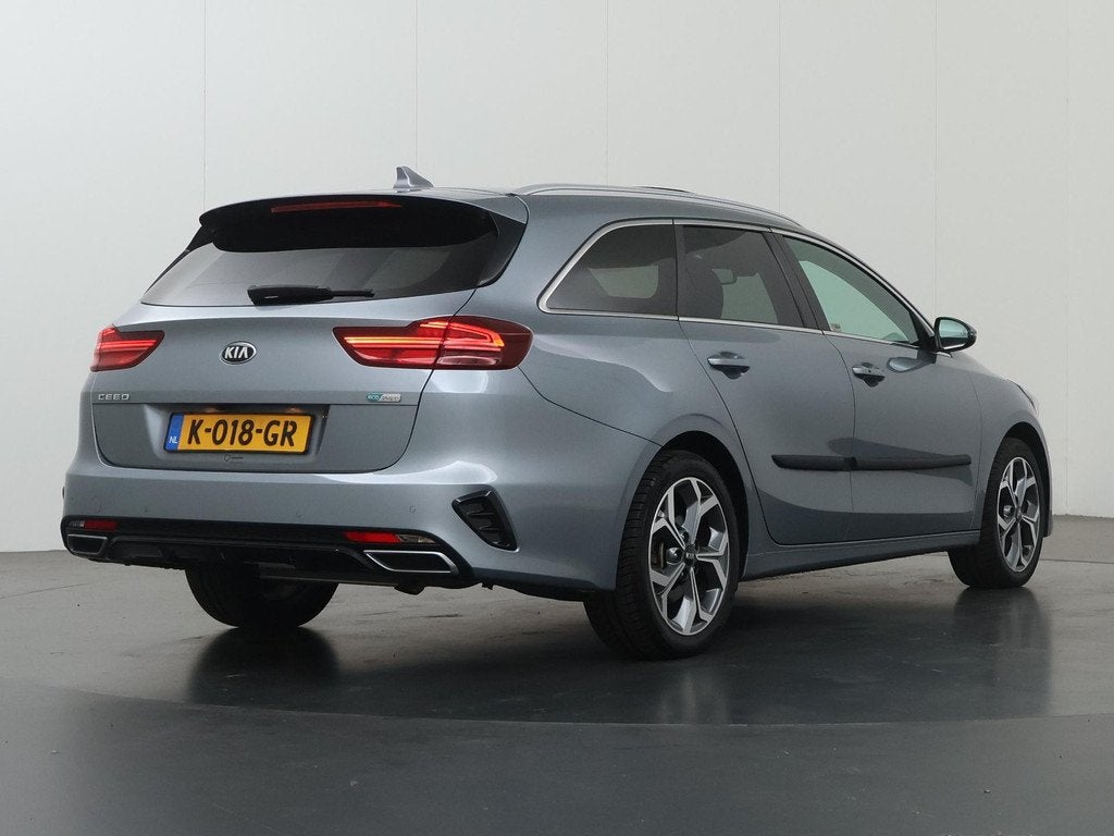 Kia Ceed Sportswagon 1.6 GDI PHEV ExecutiveLine | Trekhaak |, Auto's, Kia, Gebruikt, Zilver of Grijs, 1300 kg, Lichtsensor