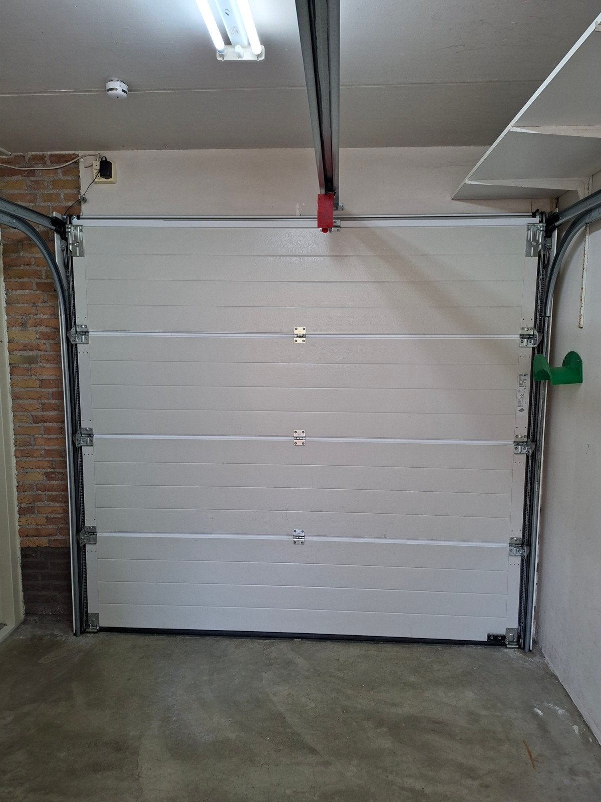 Hörmann Garagedeur LPU40 met motor en afstandsbediening, Ophalen, Gebruikt, 120 cm of meer, Garagedeur