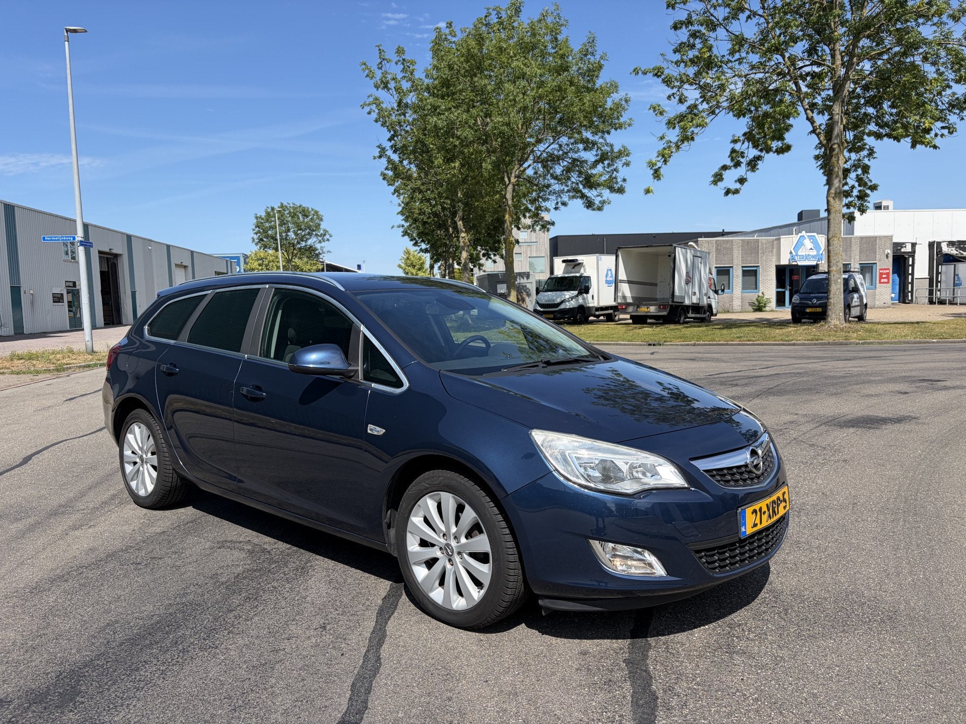 Opel Astra Sports Tourer 1.4i Turbo Cosmo 6-Bak 120 PK. Mooi, Auto's, Voorwielaandrijving, Euro 5, Gebruikt, Zwart