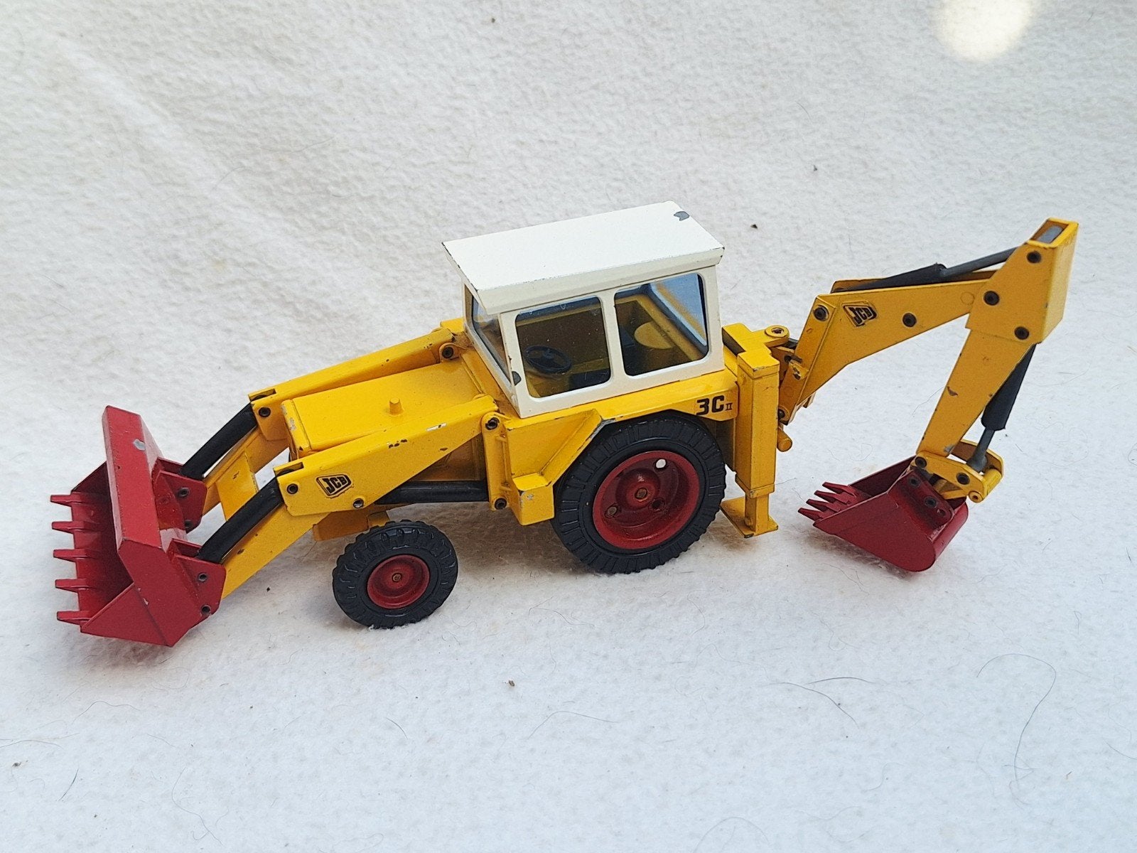 NZG Modelle JCB 3CII Graafmachine - Made in W Germany, Ophalen of Verzenden, Gebruikt, Hijskraan, Tractor of Landbouw, NZG