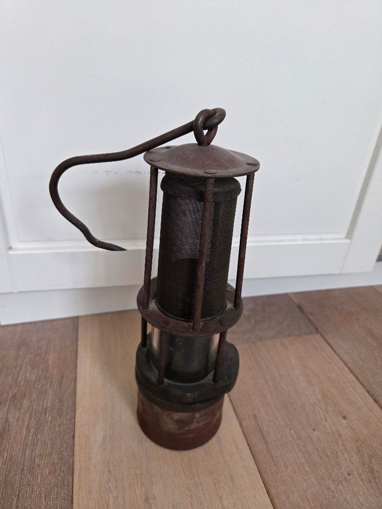 Mijnwerkerslamp, Ophalen