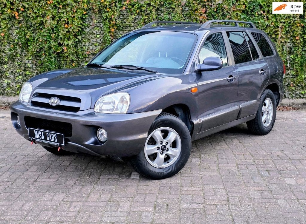 Hyundai Santa Fe 2.7i V6 4WD Style Automaat Trekhaak Airco N, Auto's, Hyundai, Automaat, Santa Fe, Gebruikt, Zwart