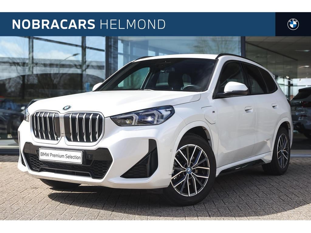 BMW X1 xDrive25e M Sport Automaat / Trekhaak / Sportstoelen, Gebruikt, Zwart, Met garantie (alle), Wit