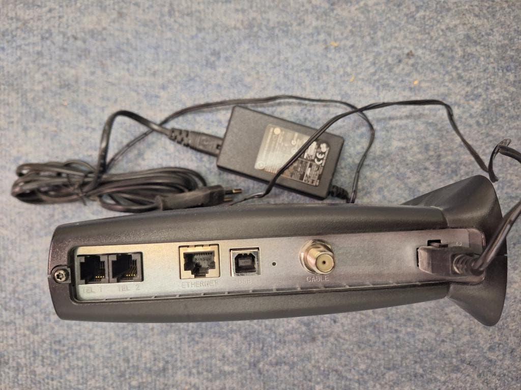 Motorola modem !!, Ophalen of Verzenden, Gebruikt, Router, Overige merken