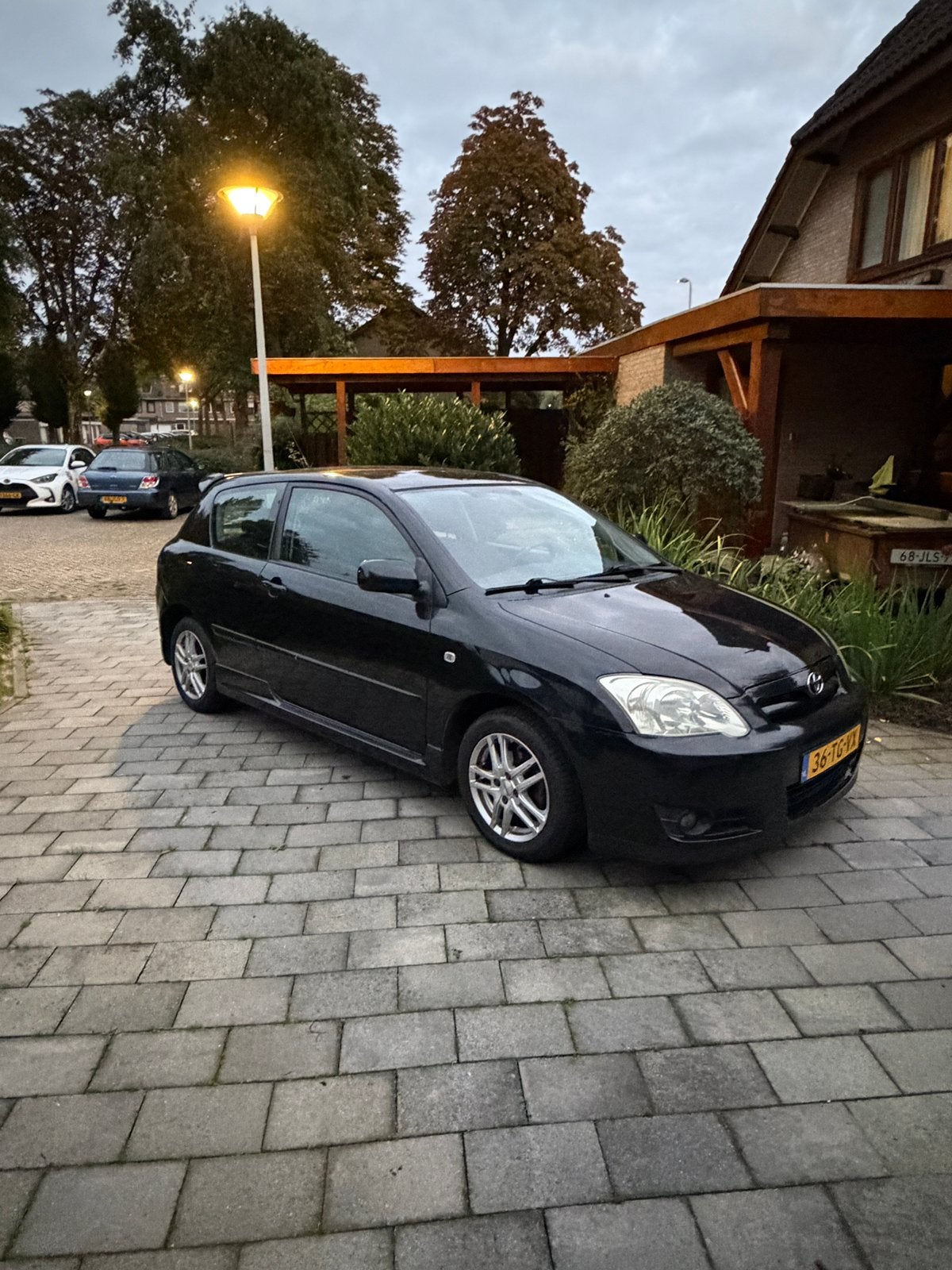 Toyota Corolla 1.6 16V Vvt-i 3DR Linea Terra 2006 Zwart, Auto's, Voorwielaandrijving, Zwart, 4 cilinders, Corolla