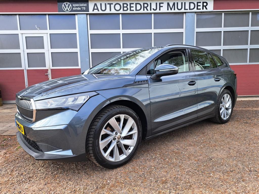 Skoda ENYAQ iV 60 180 Pk Business Edition 1/2 Leder Ecc voor, Gebruikt, Met garantie (alle), Leder, 409 km