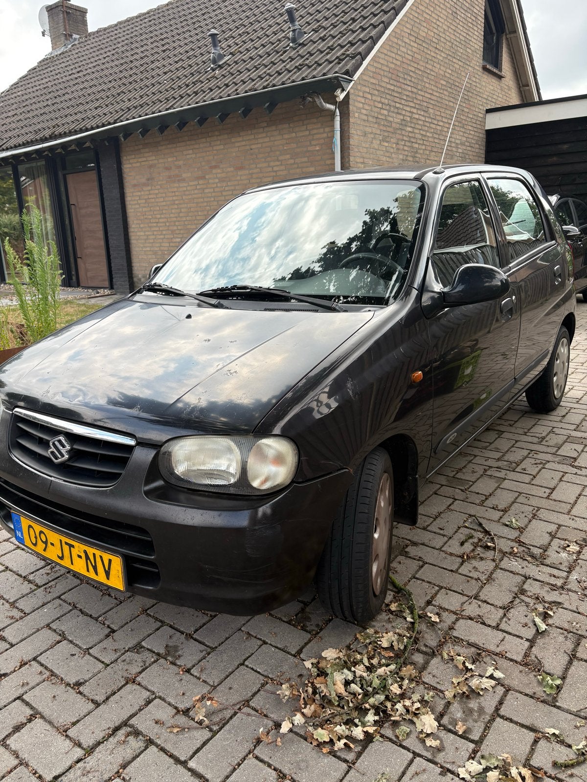 Suzuki Alto 1.1 AUT 2002 Zwart, Auto's, 4 cilinders, 4 stoelen, Zwart, Origineel Nederlands