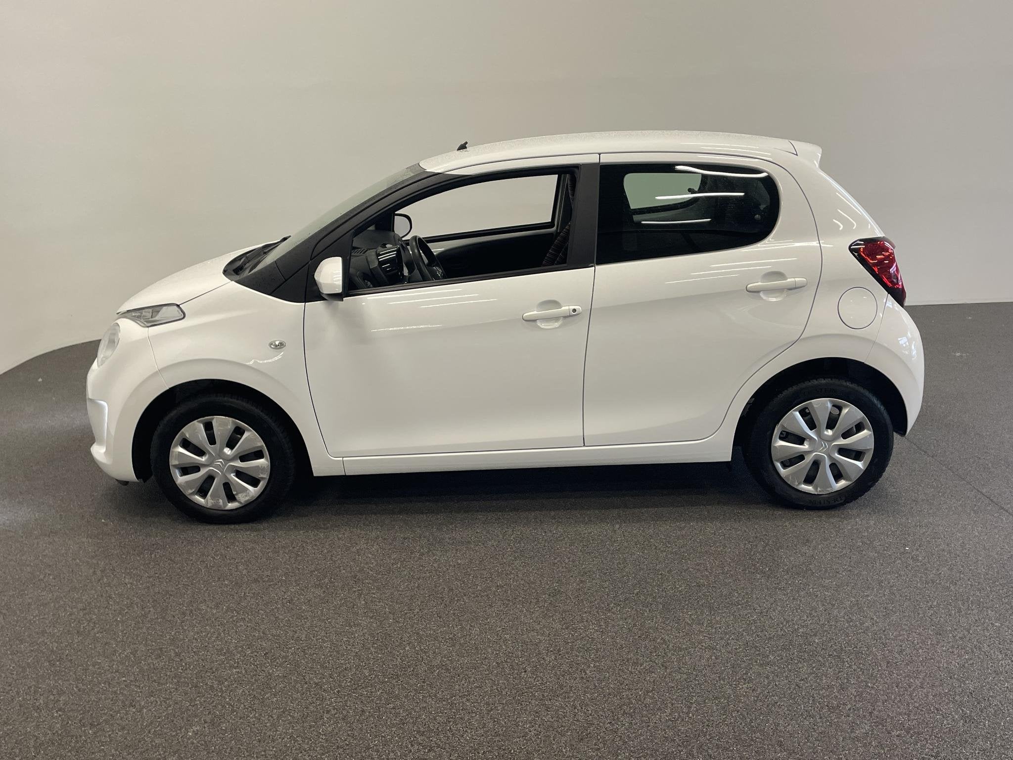 Citroen C1 1.0 VTi Feel Airco Carplay Navigatie Achteruitrij, Stof, Gebruikt, Euro 6, 4 stoelen