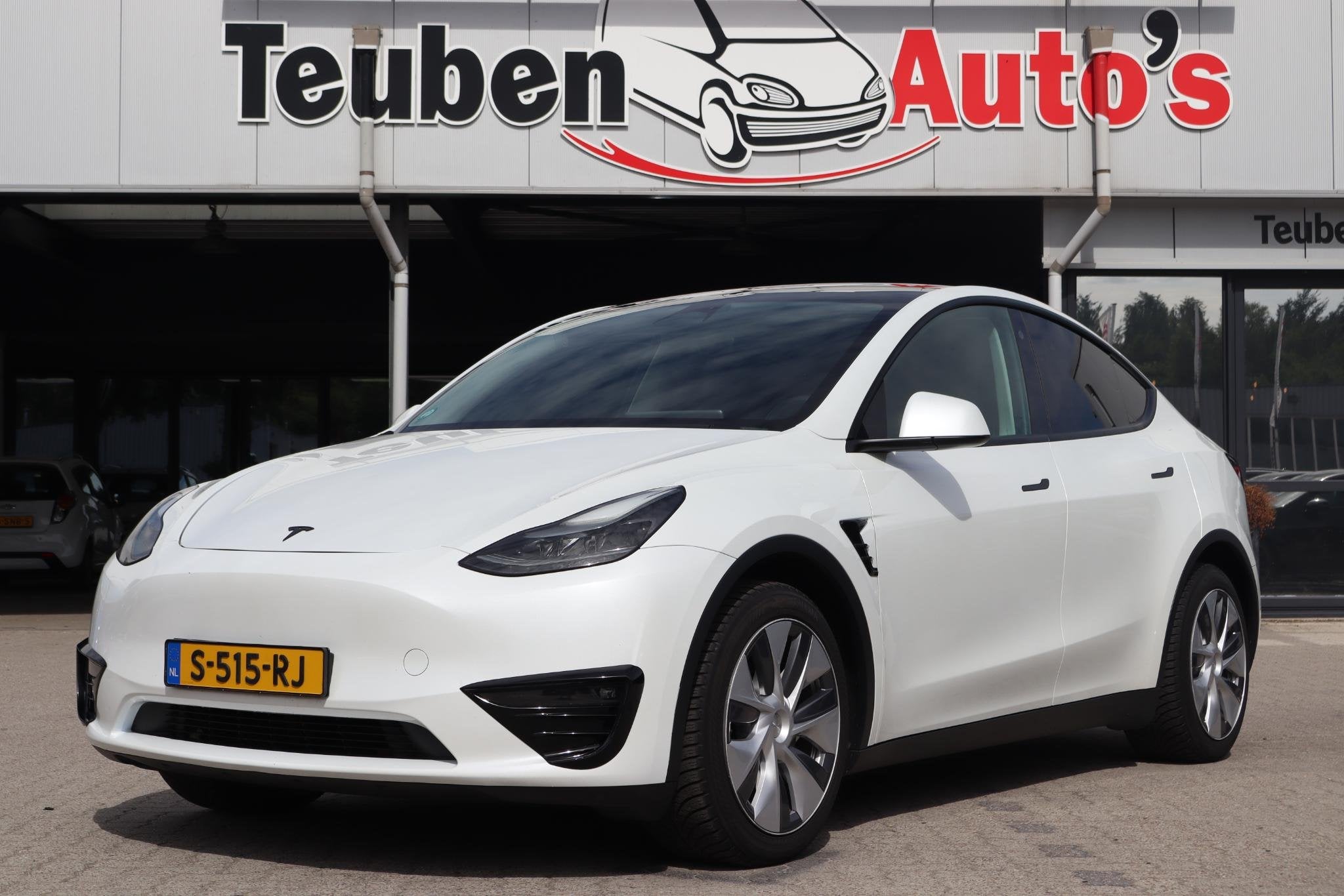 Tesla Model Y Long Range AWD 75 kWh | SOH 88,5 % | BTW auto, Stof, Gebruikt, 495 min, Navigatiesysteem