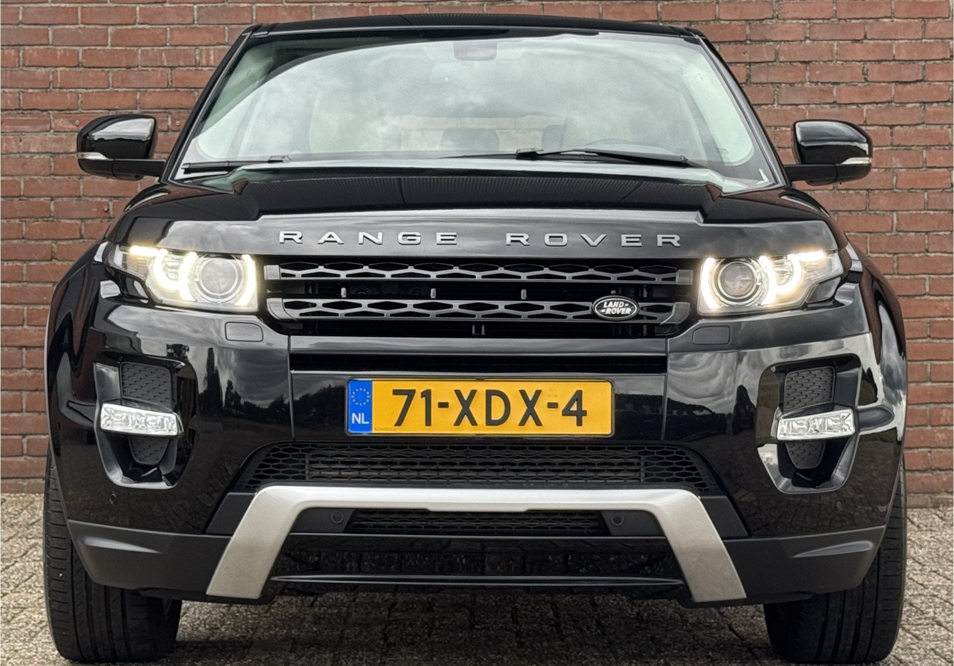 Land Rover Range Rover Evoque 2.0 SI 4WD PRESTIGE!, Auto's, Land Rover, Automaat, Beige, 4 cilinders, Zwart