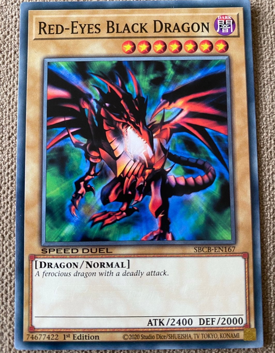 Yu-Gi-Oh! Red-Eyes Black Dragon SBCB 1st Edition !, Hobby en Vrije tijd, Verzamelkaartspellen | Yu-gi-Oh!, Ophalen of Verzenden