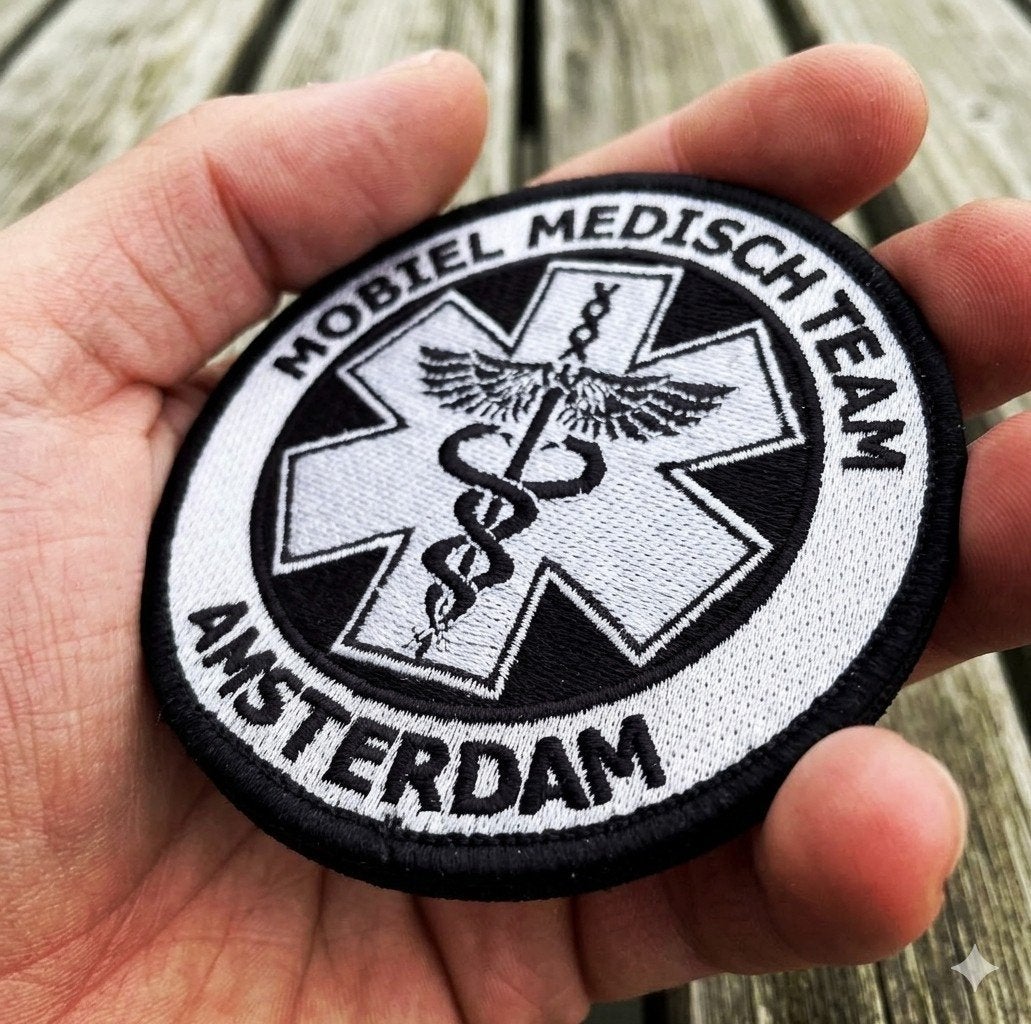 Gezocht: patch MMT lifeliner 1 Amsterdam, Verzamelen, Verzenden
