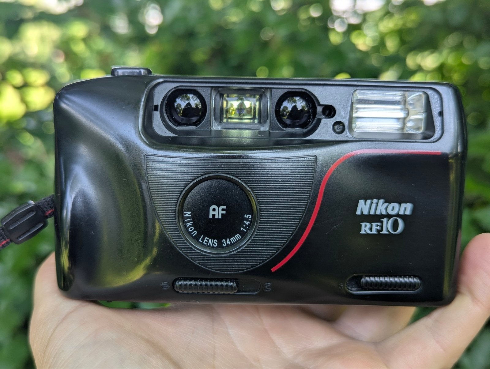 Nikon RF10 Compact Camera met AF en 34mm f/4.5 lens, Ophalen of Verzenden, Zo goed als nieuw, Compact, Nikon