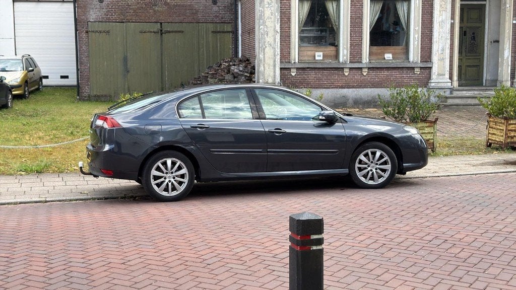 Renault Laguna 2.0 16V 103KW 2010 Grijs 227650 km, Auto's, Renault, Laguna, Stof, Zwart, 4 cilinders