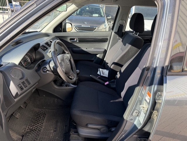 Suzuki Swift 1.3 Limited AIRCO 4X4, Auto's, Voorwielaandrijving, Dealer onderhouden, Stof, Zwart