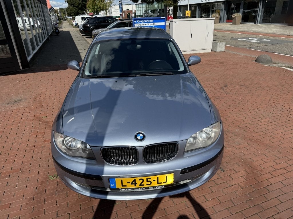 Foto 6 van BMW 1-serie 116i airco 6 versn navigatie 174dkm (bj 2009)