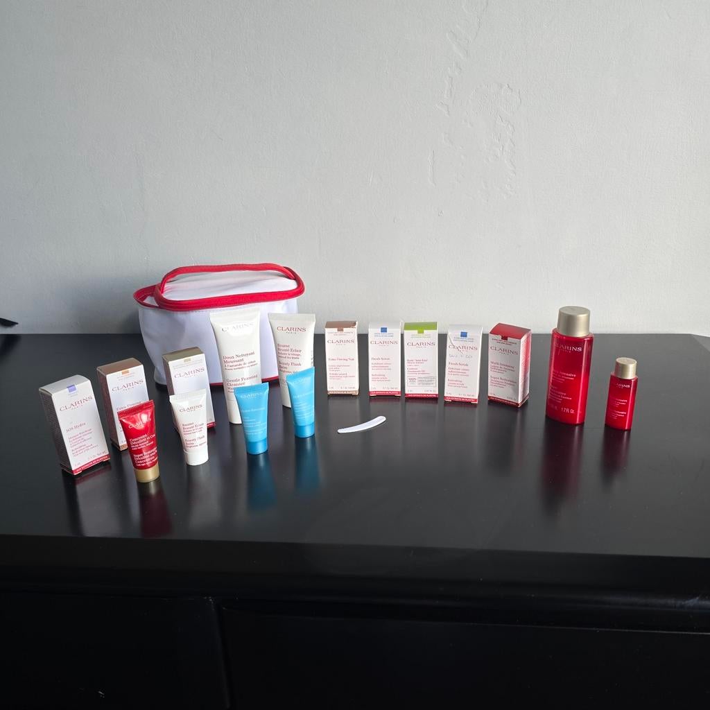 CLARINS Toiletcase vol met Clarins huidverzorging., Ophalen of Verzenden, Nieuw, Gehele gezicht