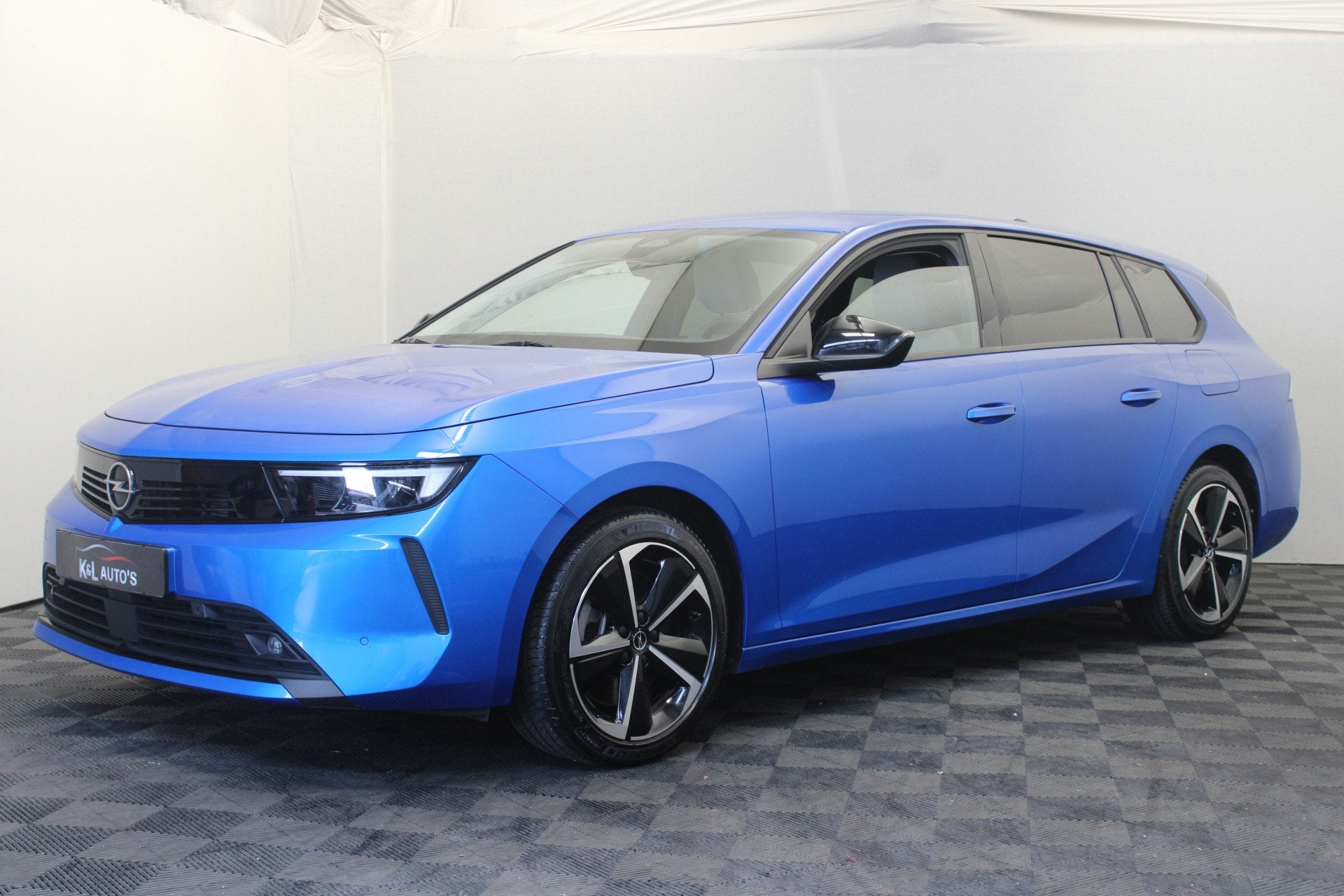 Opel Astra 1.6 Turbo Plug In Hybrid Edition |Stoel/stuur ver, Auto's, Opel, Stof, 4 cilinders, Blauw, Origineel Nederlands