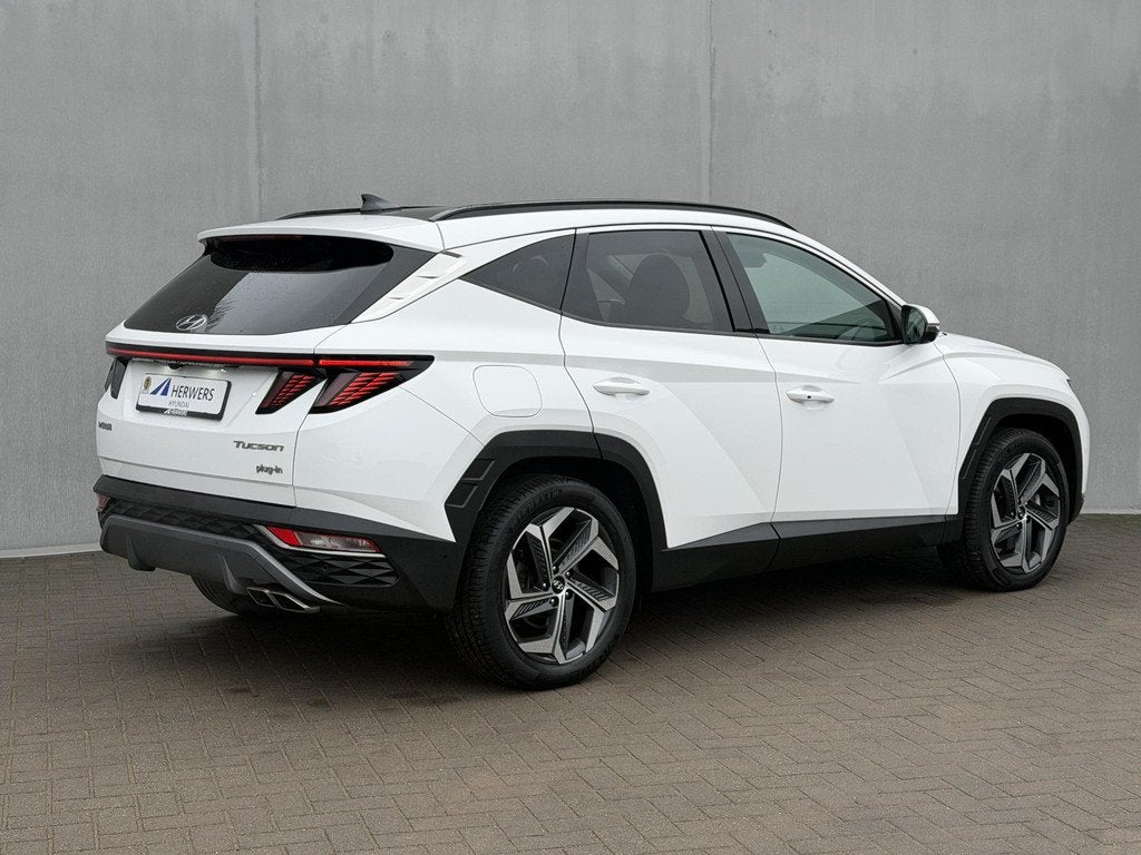 Hyundai Tucson 1.6 T-GDI PHEV Premium Sky 4WD / Dealer Onder, Auto's, Hyundai, 1350 kg, 14 kWh, Gebruikt, Euro 6
