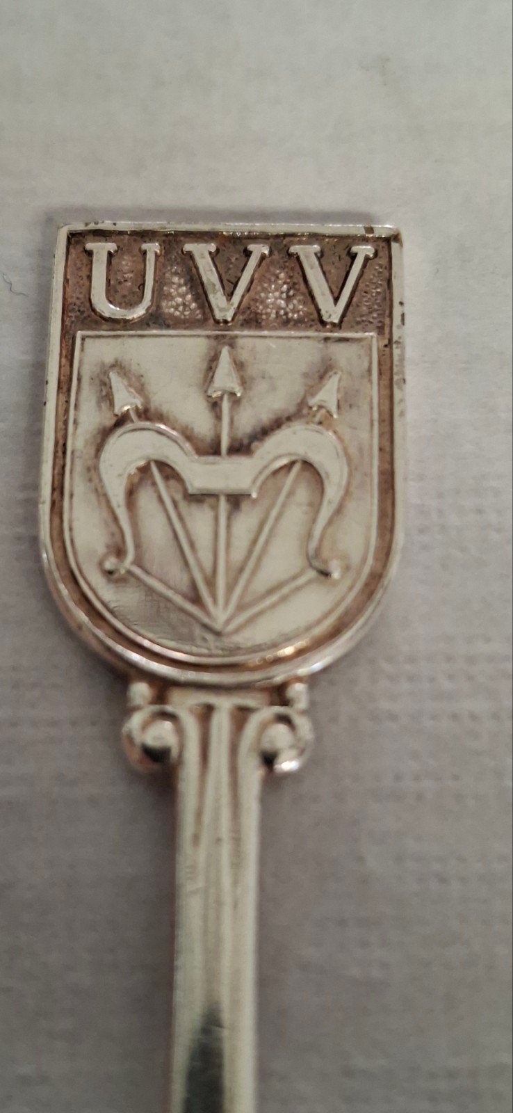 Verzilverde theelepel met UVV-embleem, Ophalen of Verzenden