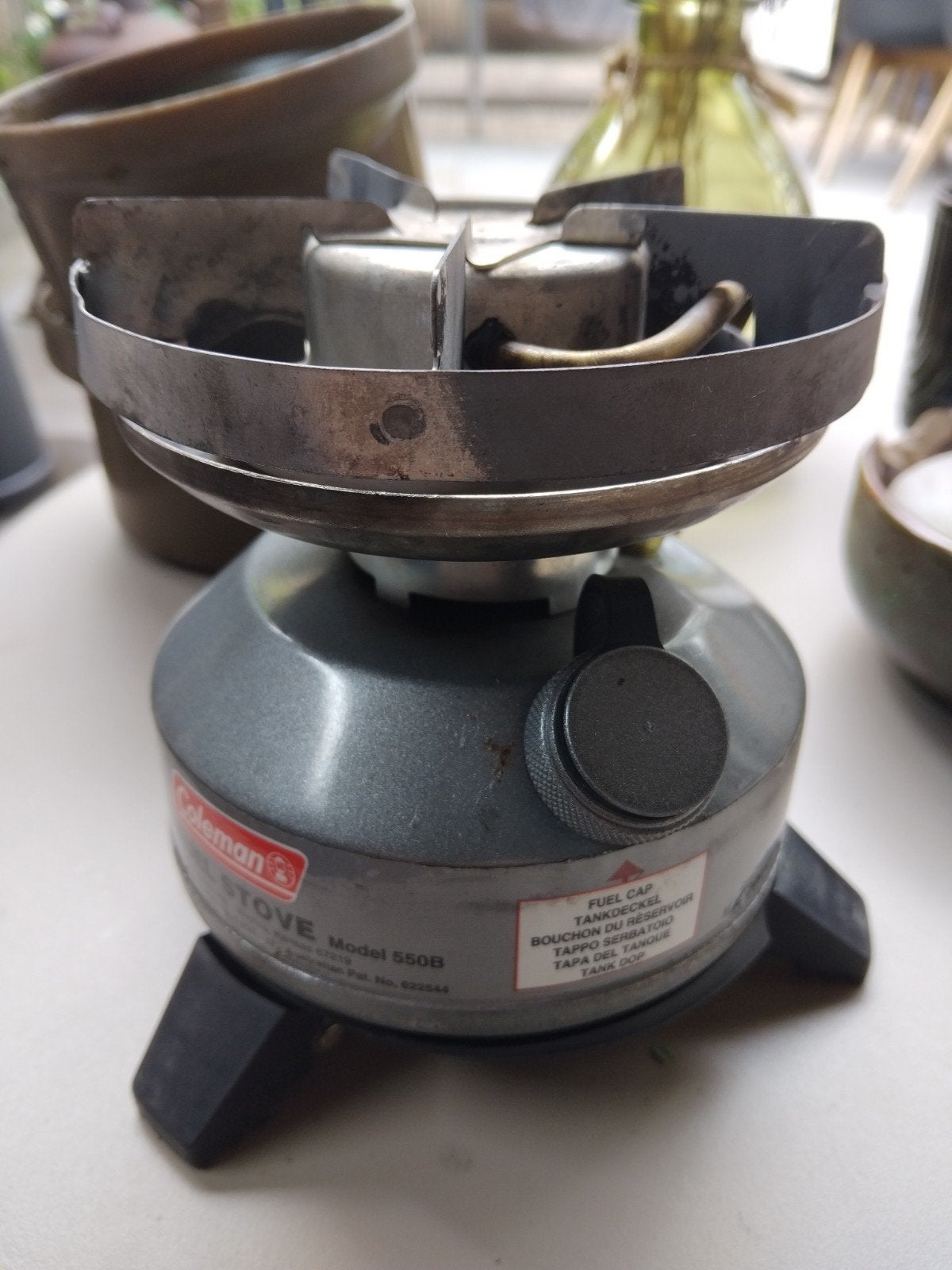 Coleman Multi-Fuel brander met houder, Ophalen of Verzenden, Gebruikt