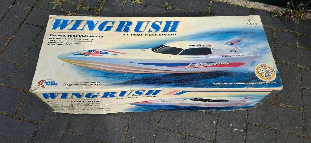 Radiografische speedboot met reserve onderdelen, Ophalen