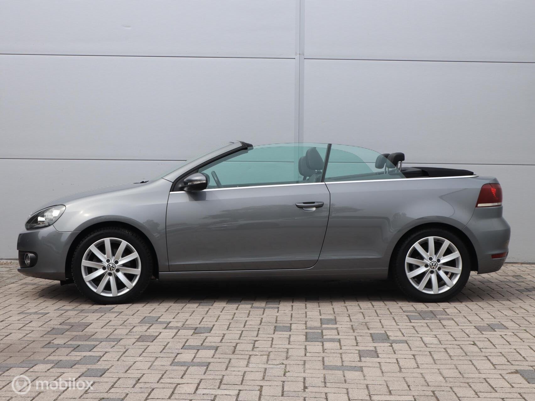Volkswagen Golf Cabrio 1.2 TSI Leer Navi LED Cruise Clima, Auto's, Voorwielaandrijving, Euro 5, Zwart, 4 cilinders
