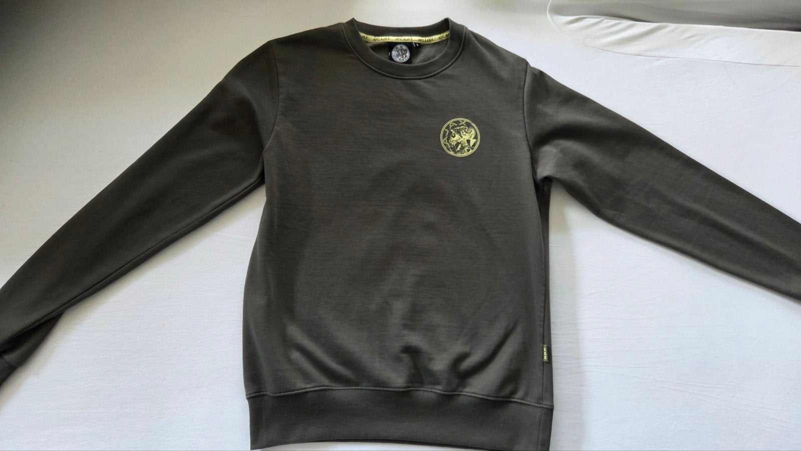 Nieuwe Ajax Green Essential Sweater 2025/2026 - Maat L, Maat 52/54 (L), Nieuw, Ophalen of Verzenden, Ajax