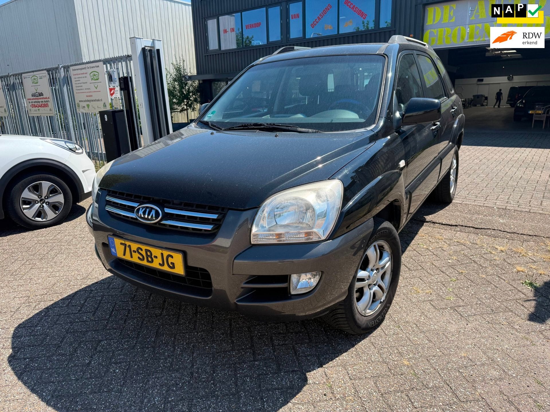 Kia Sportage 2.0 CVVT Executive, Auto's, Stof, Gebruikt, Zwart, 4 cilinders